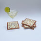 Set of four geometric patterned arabesque wood coasters inlaid with mother of pearl, marquetry, fair trade