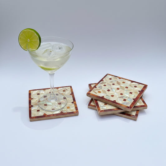 Set of four geometric patterned arabesque wood coasters inlaid with mother of pearl, marquetry, fair trade