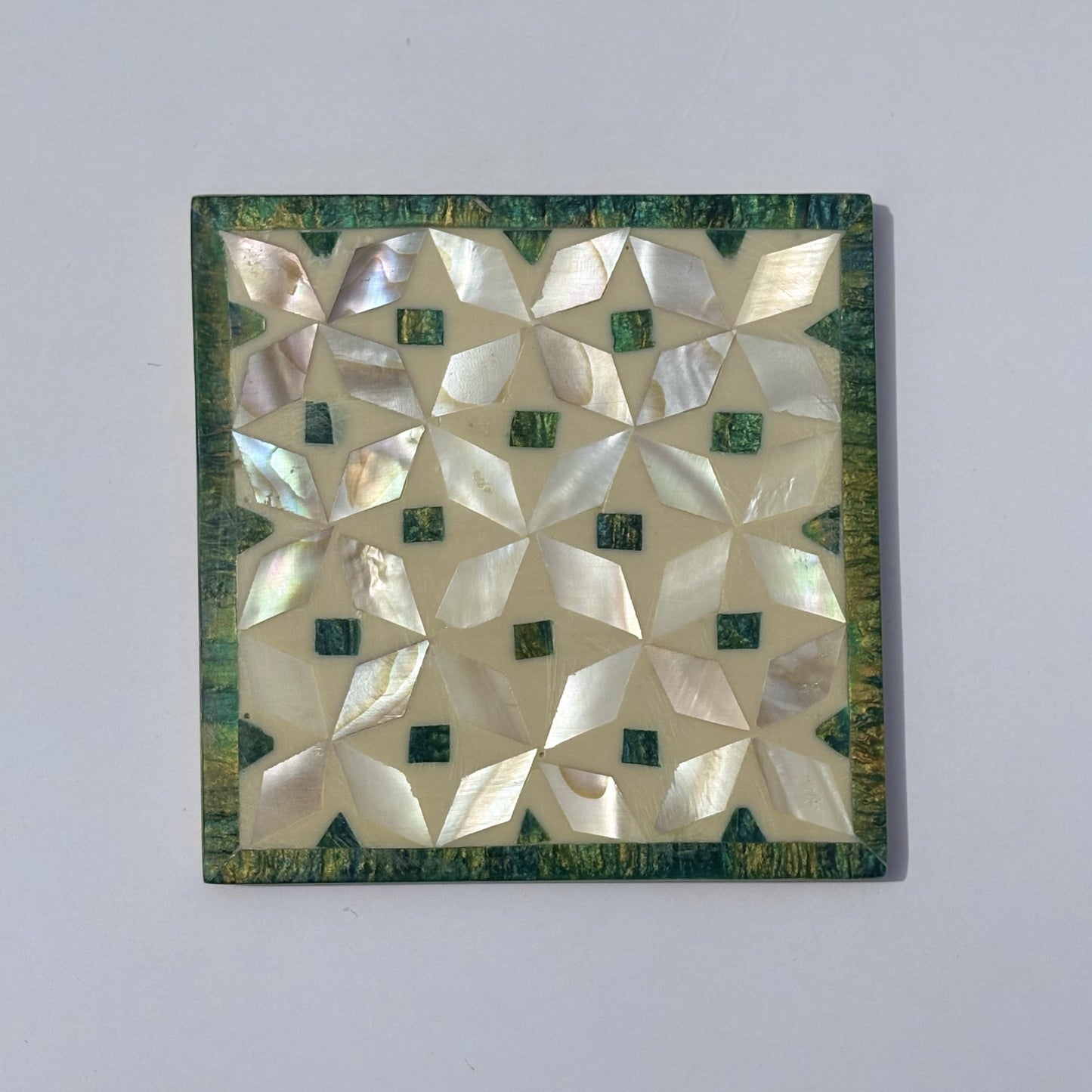 Set of four square wood coasters inlaid with mother of pearl in a geometric pattern, fair trade handmade, arabesque marquetry