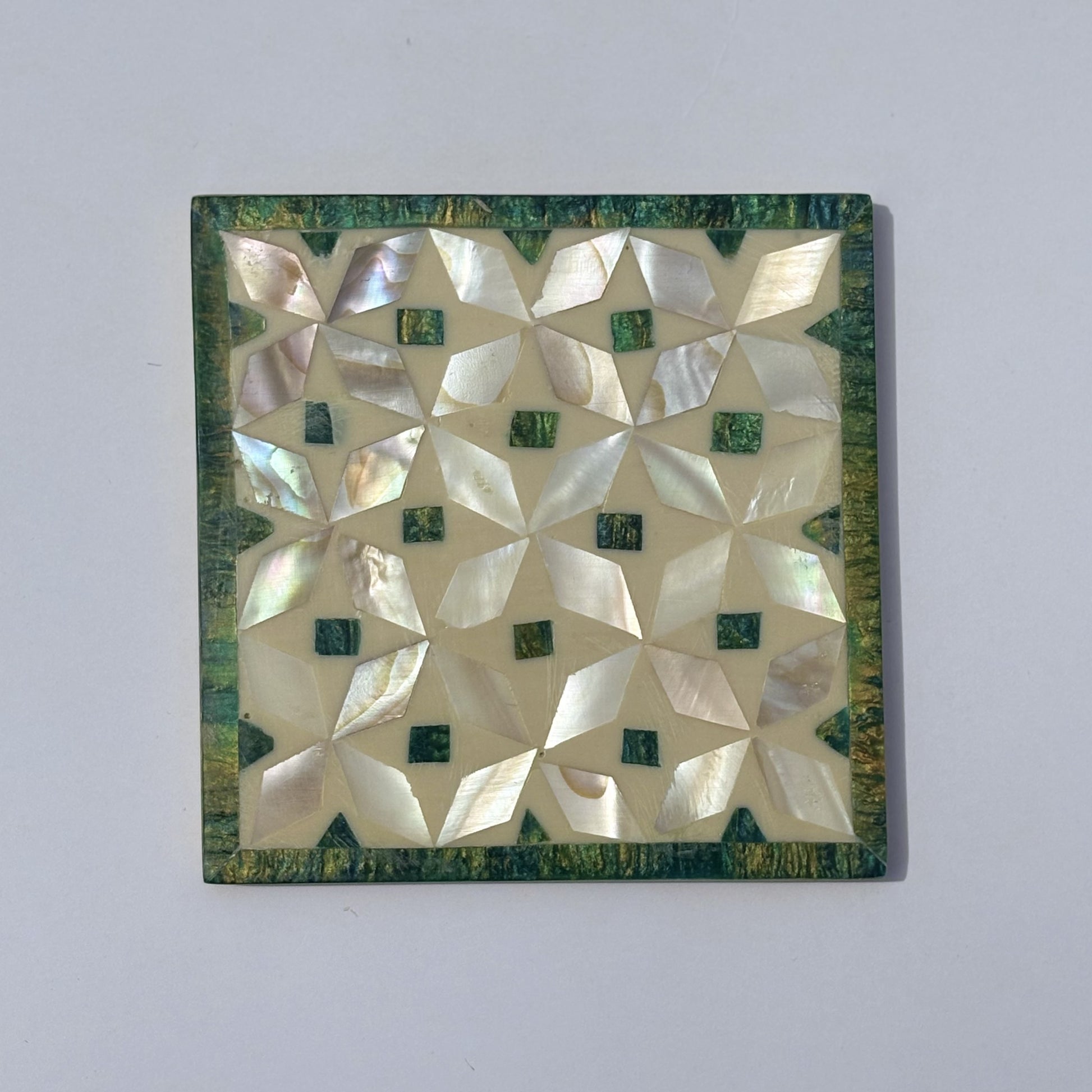 Set of four square wood coasters inlaid with mother of pearl in a geometric pattern, fair trade handmade, arabesque marquetry