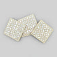 Set of four geometric patterned arabesque wood coasters inlaid with mother of pearl, marquetry, fair trade