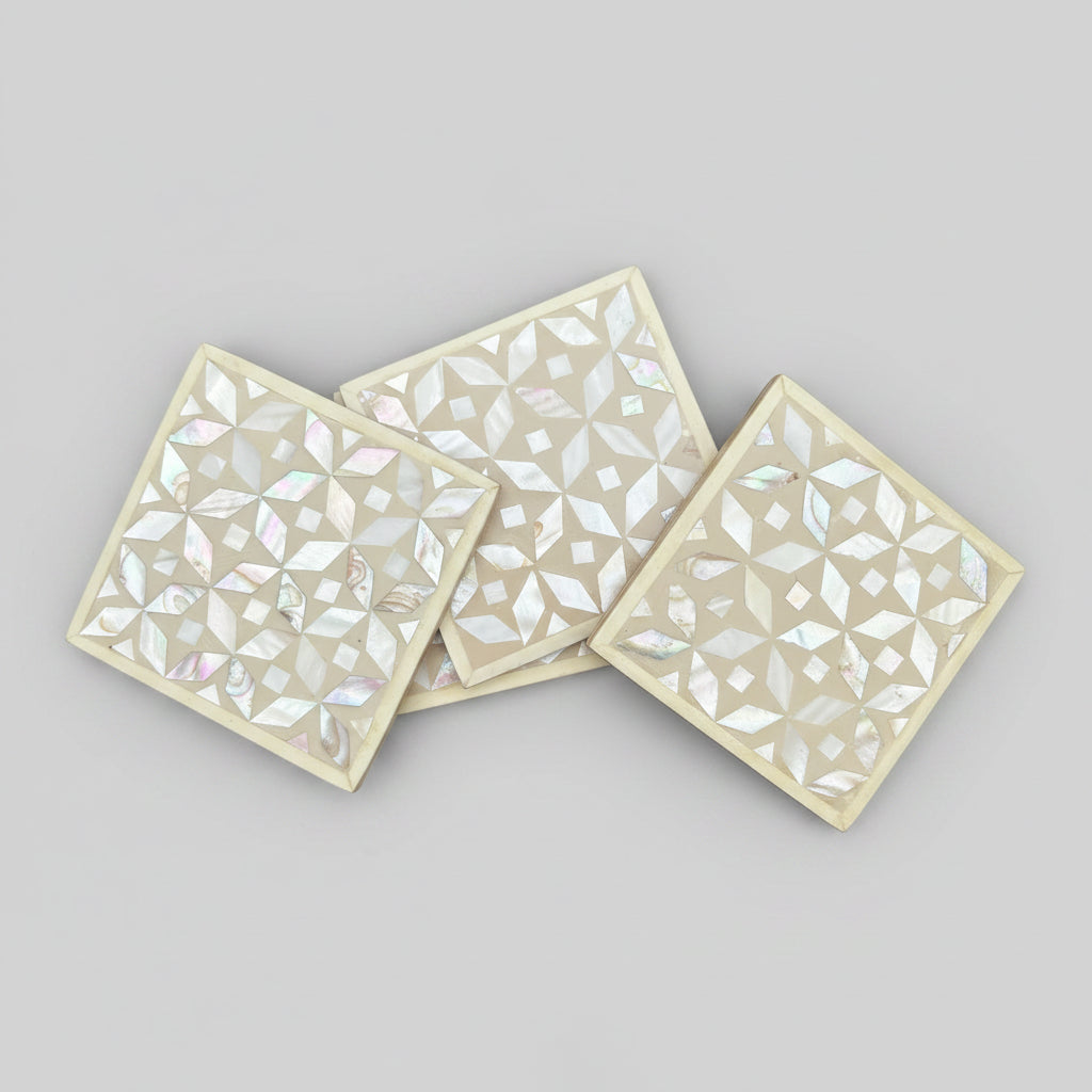 Set of four geometric patterned arabesque wood coasters inlaid with mother of pearl, marquetry, fair trade