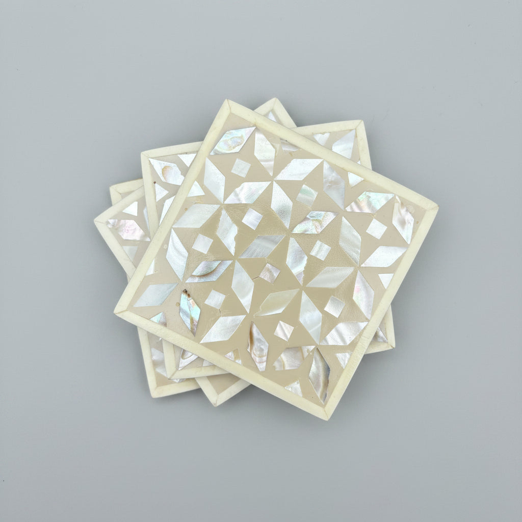 Set of four geometric patterned arabesque wood coasters inlaid with mother of pearl, marquetry, fair trade