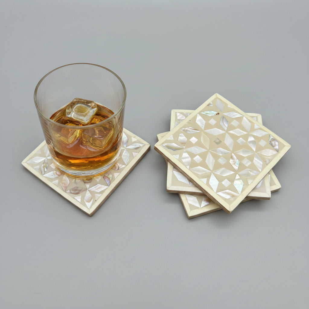 Set of four geometric patterned arabesque wood coasters inlaid with mother of pearl, marquetry, fair trade