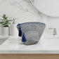 Gray patterned pouch with blue tassels, Toha Handcrafted Cosmetic Bags