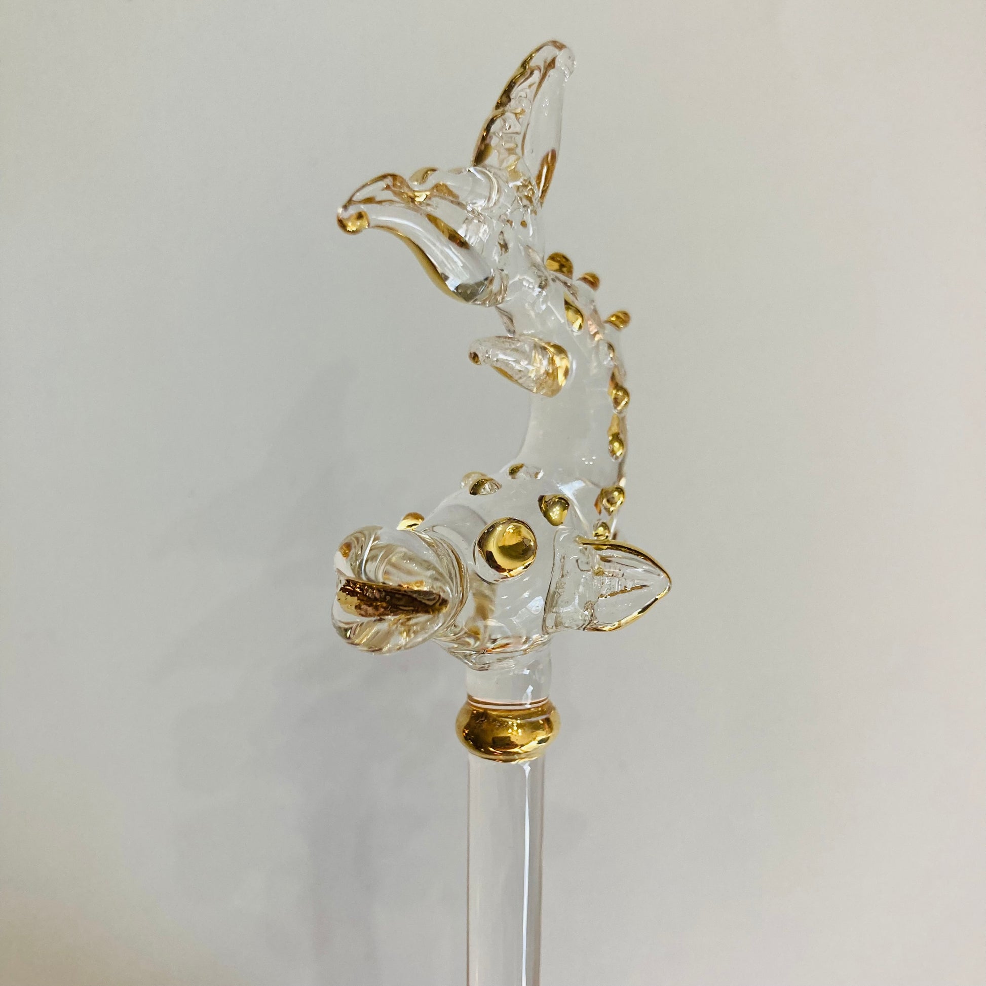 Handmade glass cocktail stirrer decorated with a handcrafted fish with gold detail, fair trade