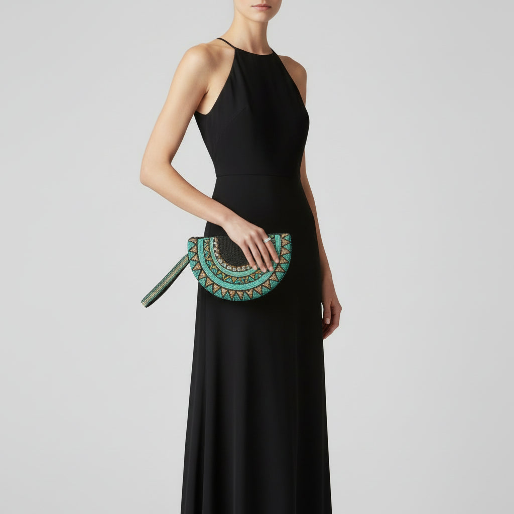 Fair Trade Half moon hand-beaded wristlet clutch with geometric patterns in black & teal, Sustainable Fashion