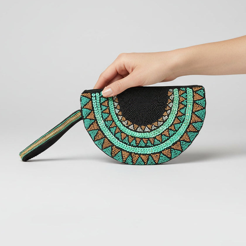 Fair Trade Half moon hand-beaded wristlet clutch with geometric patterns in black & teal, Sustainable Fashion