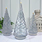 Modern-looking light blue hand-blown glass decorative tabletop Christmas trees with swirl design