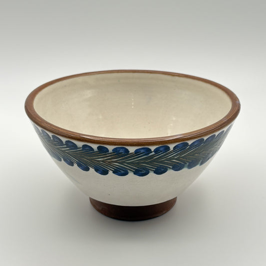 Handcrafted fair trade ceramic bowl with blue and green pattern