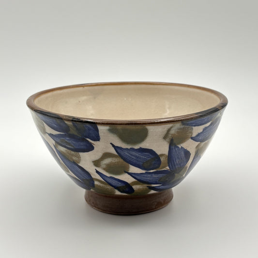 Handmade ceramic bowl with blue and olive leaves pattern