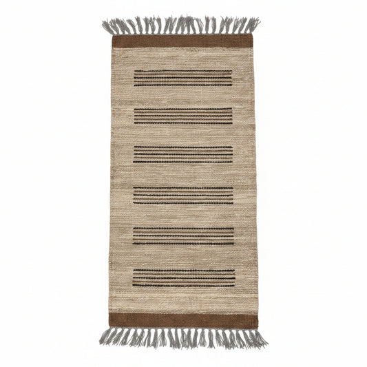 Rectangular handwoven runner rug with fringes. Natural tan base with horizontal stripes in dark brown and black. Fair trade handmade.