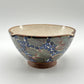 Handmade ethically crafted ceramic bowl with floral pattern