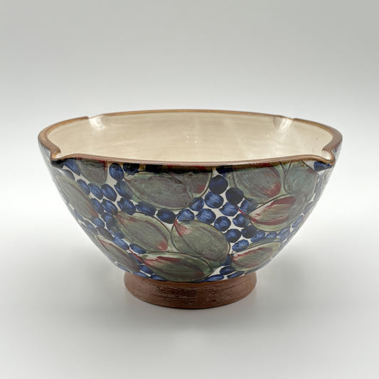Handmade ethically crafted ceramic bowl with floral pattern