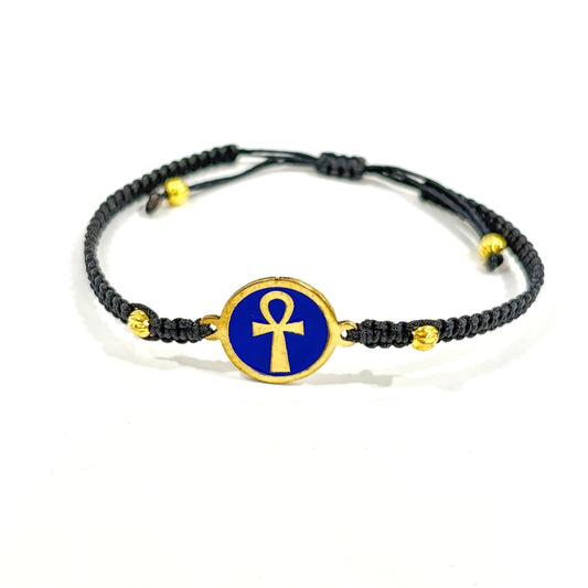 Handmade brass bracelet with an Ankh symbol on a blue enamel background