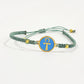Handmade brass bracelet with an Ankh symbol on a turquoise enamel background