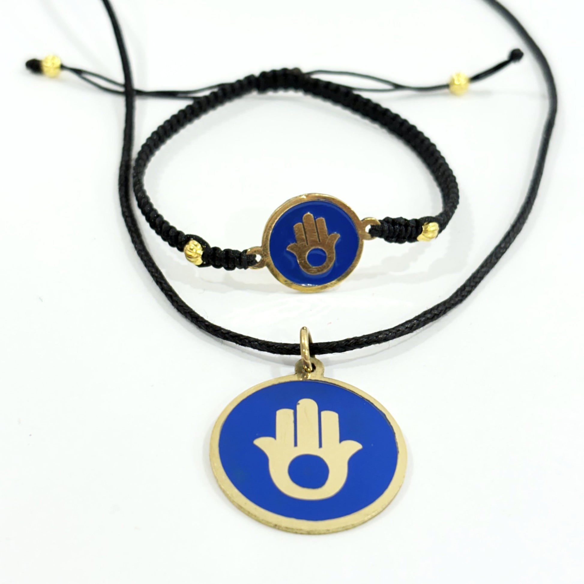 Handmade brass pendant and macrame bracelet with gold Hamsa hand on blue enamel on a black cord, fair trade, ethically handmade