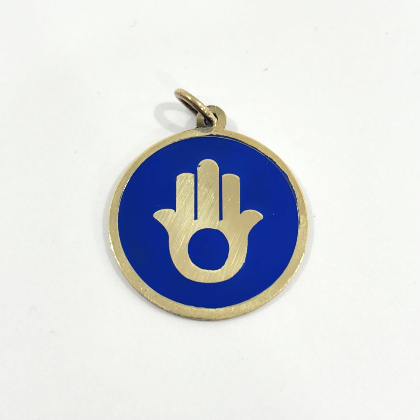 Handmade brass pendant with gold Hamsa hand on blue enamel on a black cord, fair trade, ethically handmade