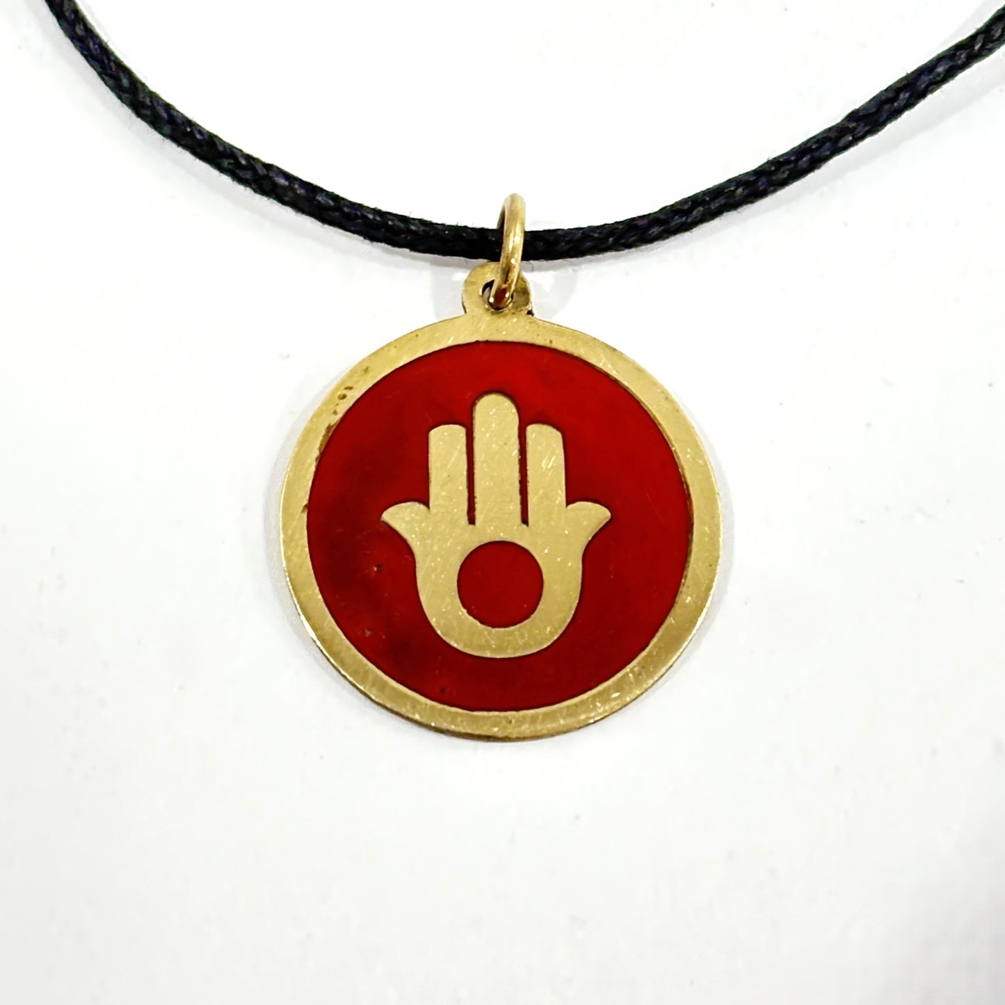 Handmade brass pendant with gold Hamsa hand on maroon brown enamel on a black cord, fair trade, ethically handmade