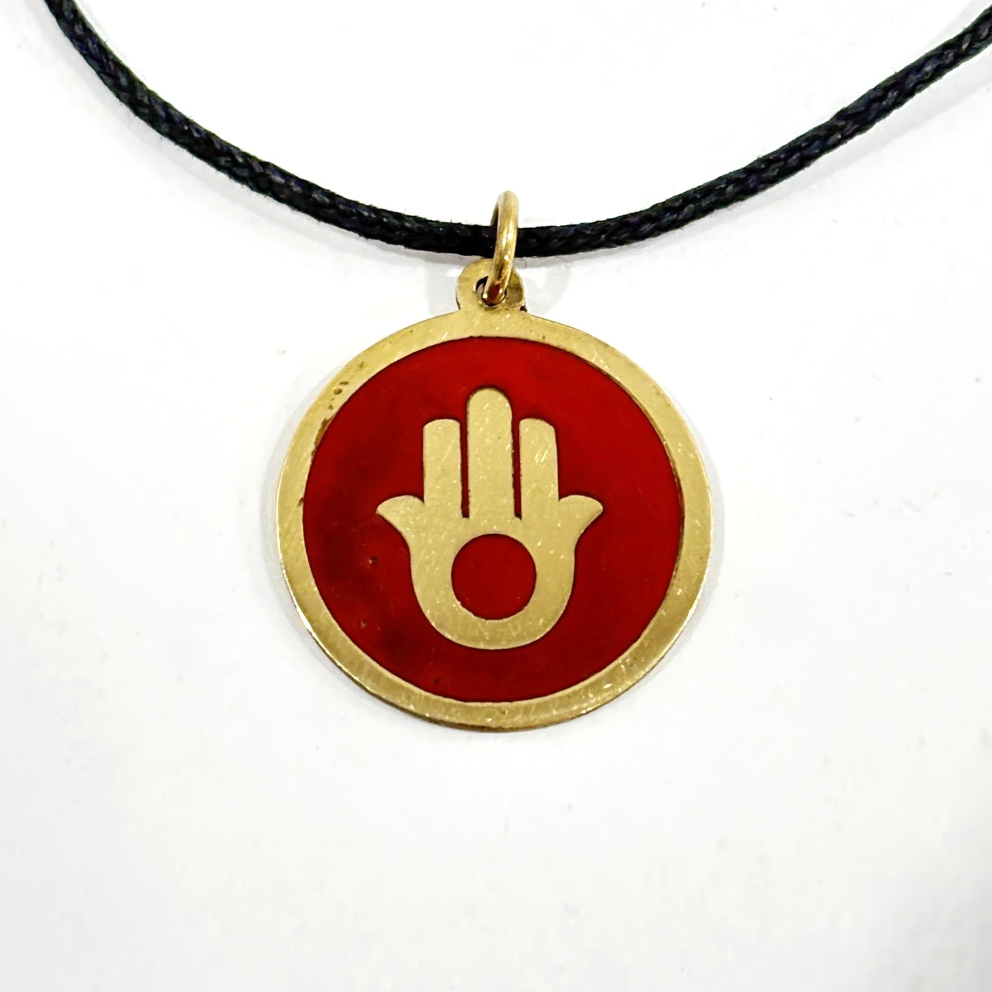 Handmade brass pendant with gold Hamsa hand on maroon brown enamel on a black cord, fair trade, ethically handmade