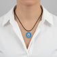 Handmade brass and enamel turquoise and gold Hamsa hand pendant on a black cord 