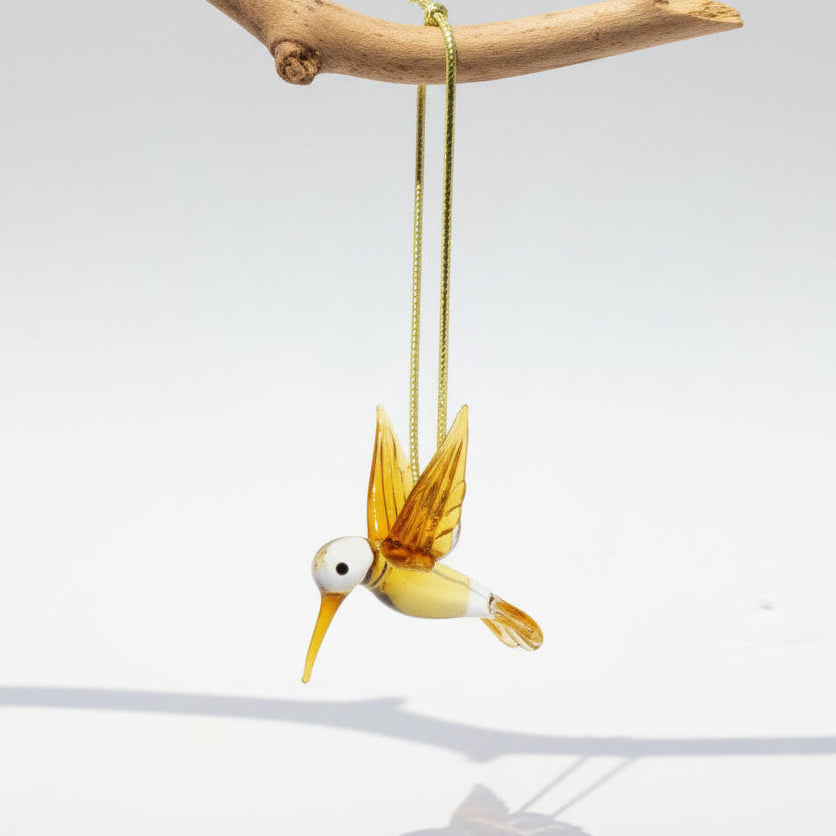 Fair trade artisanal handmade glass hummingbird in amber