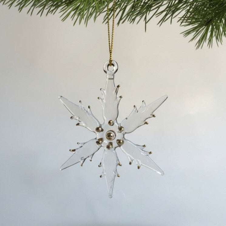 Handmade glass snowflake ornament with gold accents 