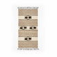 Rectangular handwoven wool rug with fringes, featuring horizontal stripes and geometric diamond patterns in beige, cream, brown, and black, fair trade handmade