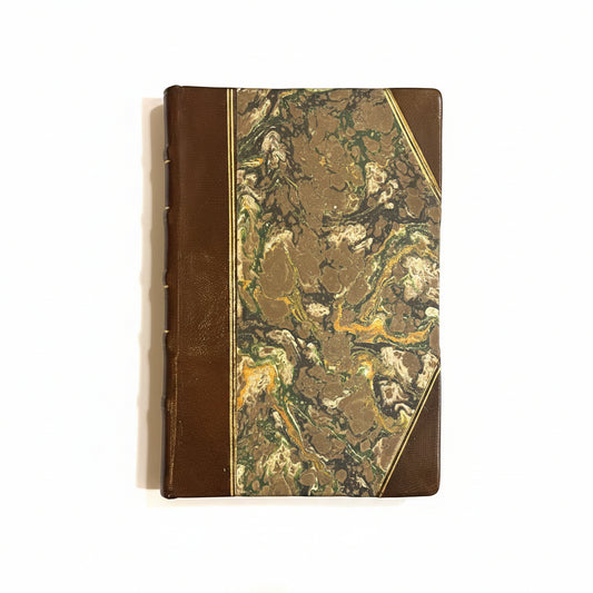 Hand-bound hardcover notebook with brown leather binding and corners, featuring a marbled Ebru paper and thin gold decorative lines, Fair trade handcrafted