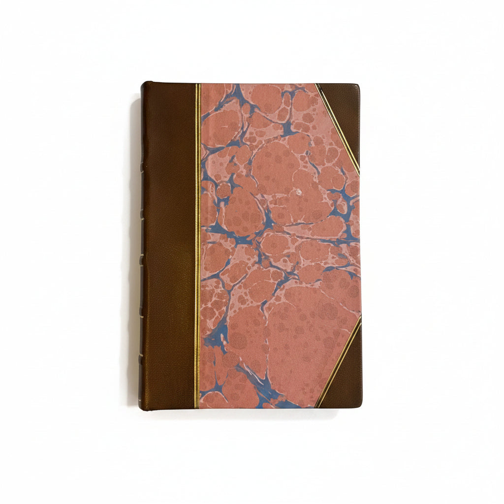 Hand-bound hardcover notebook with brown leather binding and corners, featuring a marbled Ebru paper and thin gold decorative lines, Fair trade handcrafted
