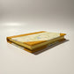 Handmade notebook journal with marbled paper cover and mustard leather corners 