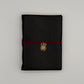 Handcrafted black leather journal with red string and gold Scarab charm, cruelty-free, fair trade, ethically handmade