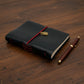 Handcrafted black leather journal with red string and gold Scarab charm, cruelty-free, fair trade, ethically handmade