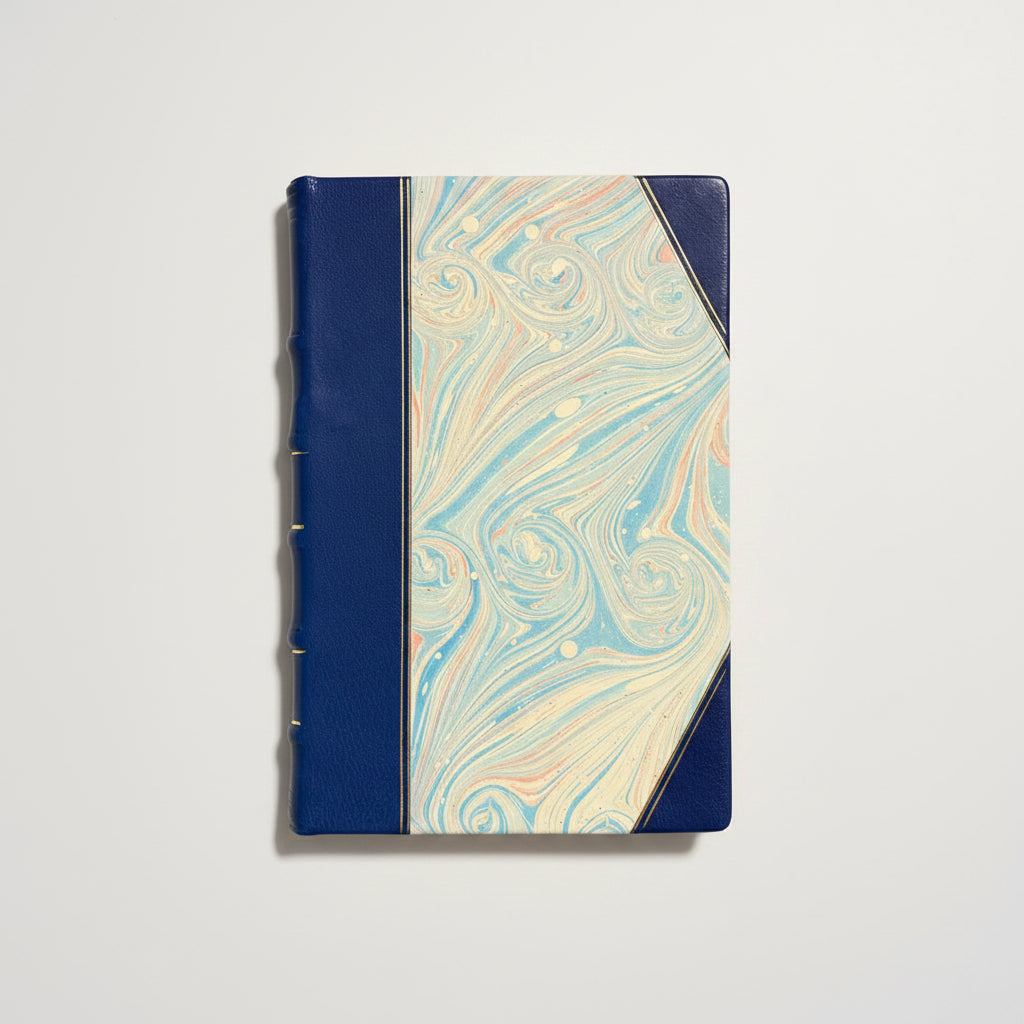Handcrafted journal notebook with blue leather and marbled paper cover, fair trade