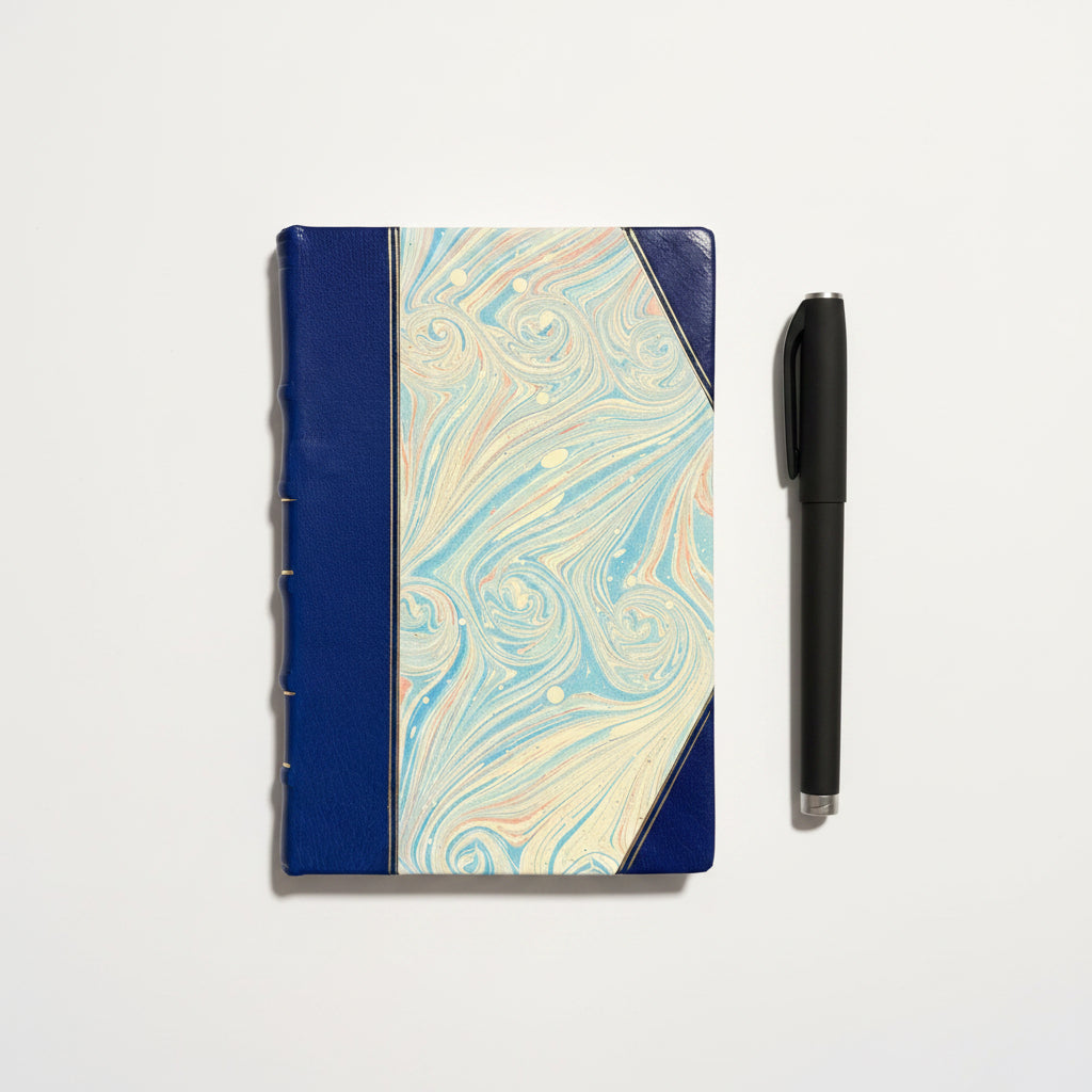Handcrafted journal notebook with blue leather and marbled paper cover, fair trade