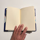 Handcrafted journal notebook with blue leather and marbled paper cover, fair trade