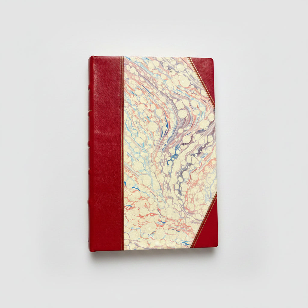 Handmade journal notebook with red leather binding and marbled paper cover, fair trade