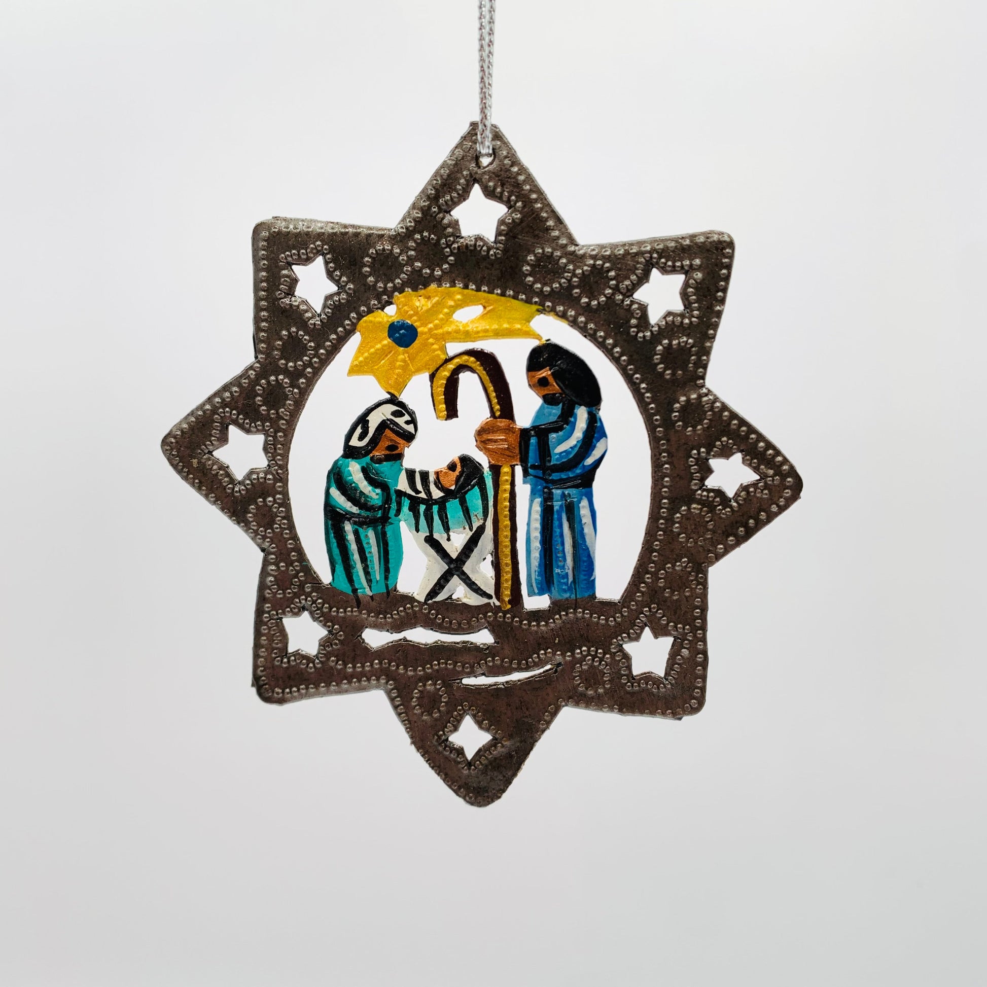 Upcycled Metal Nativity Ornament in a Star in Teal, Blue and Yellow Handcrafted by Artisans in Haiti