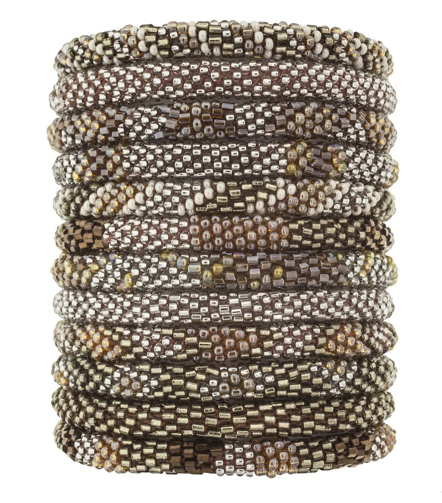 Hand-beaded bracelets in various shades of brown and beige, ethically handmade by women artisans of glass beads, fair trade