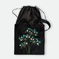 Handmade black tote bag with hand-embroidered white and turquoise hydrangea, fair trade