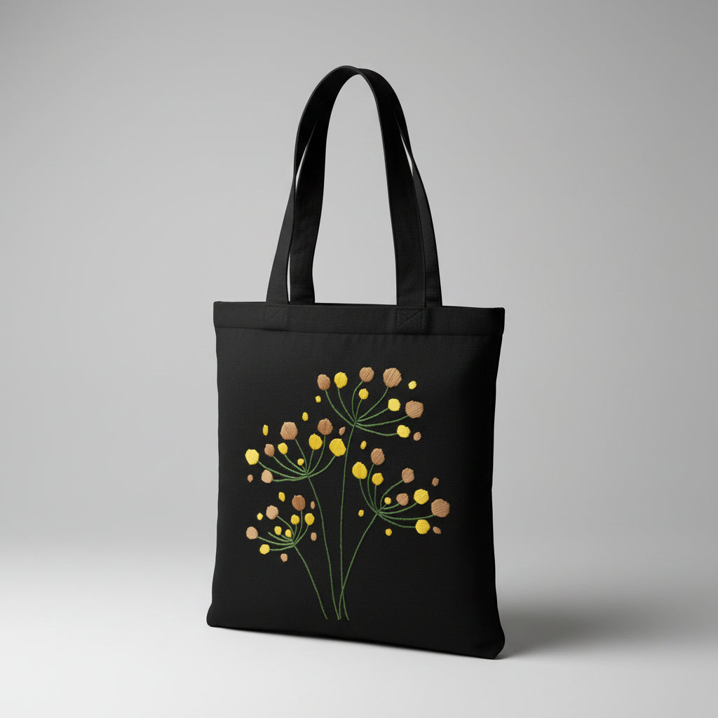Handmade black tote bag with hand-embroidered yellow and orange hydrangea, fair trade