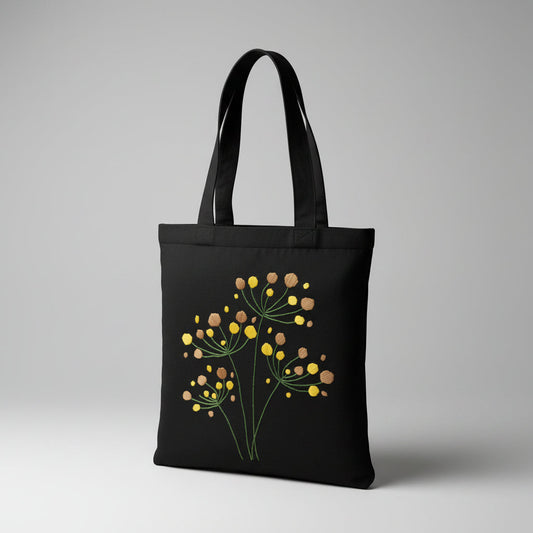 Handmade black tote bag with hand-embroidered yellow and orange hydrangea, fair trade