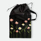 Handmade black tote bag with hand-embroidered pink and white marguerite, fair trade