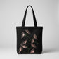 Black canvas tote bag with hand-embroidered pink papyrus design, fair trade handmade