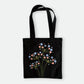 Handmade black tote bag with hand-embroidered light blue and pink hydrangea, fair trade