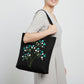 Handmade black tote bag with hand-embroidered white and turquoise hydrangea, fair trade