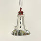 Fair trade handcrafted upcycled metal lighthouse ornament with a red top, sustainably crafted, artisan made