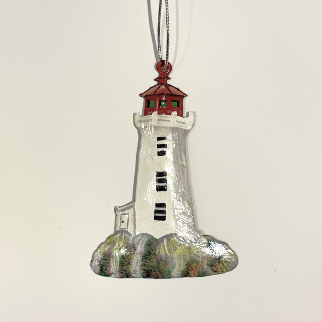 Fair trade handcrafted upcycled metal lighthouse ornament with a red top, sustainably crafted, artisan made