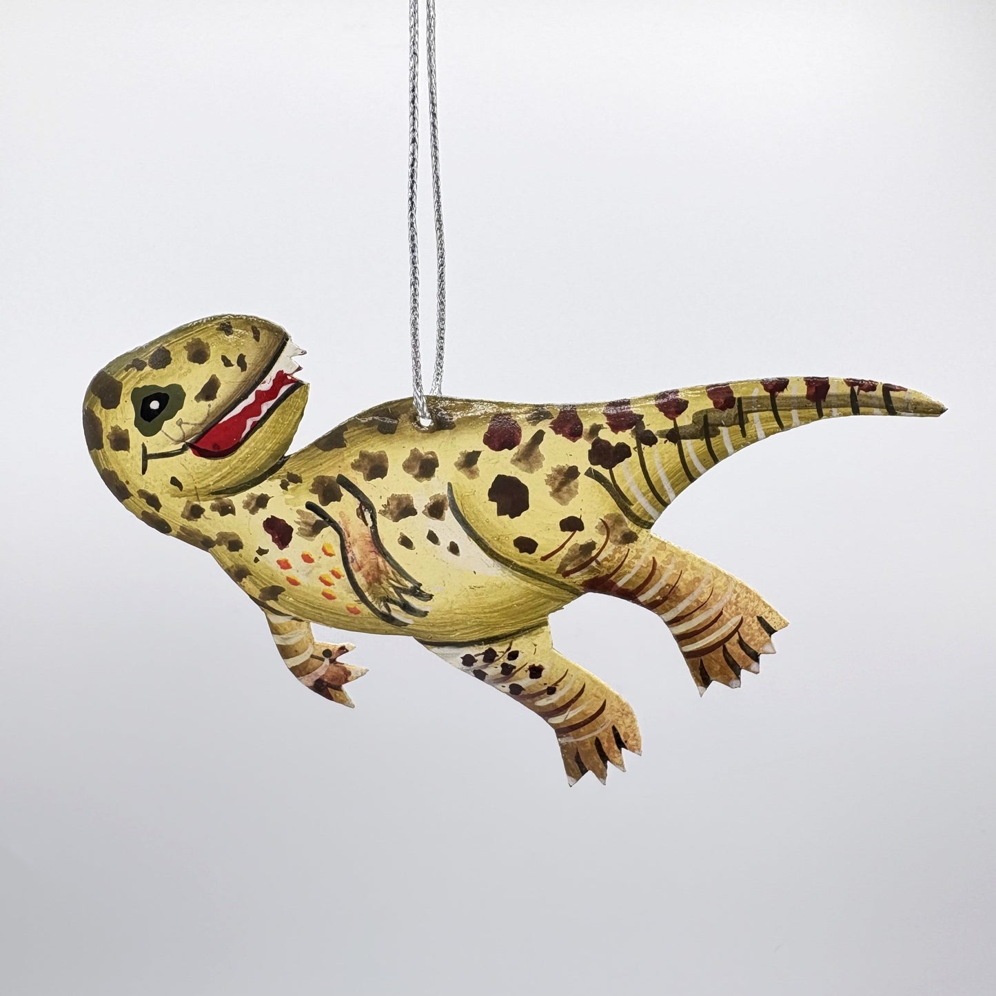 Sustainable handcrafted upcycled metal T-Rex Dinosaur ornament, eco-friendly ethically handmade, fair trade