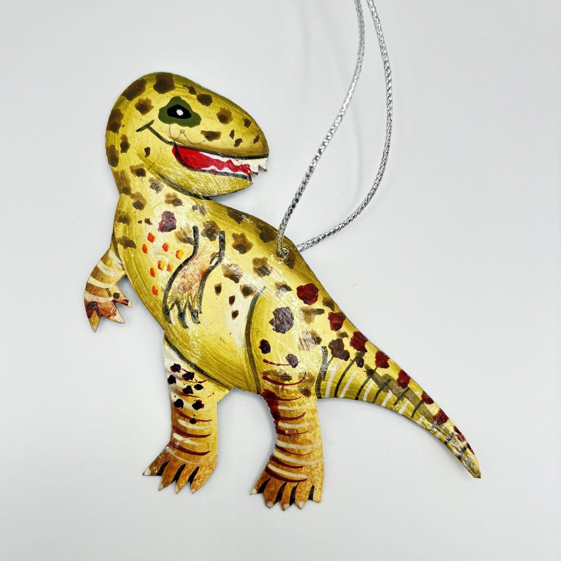 Sustainable handcrafted upcycled metal T-Rex Dinosaur ornament, eco-friendly ethically handmade, fair trade